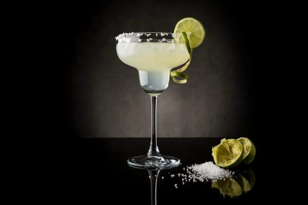 Margarita with a salted rim and a lime slice